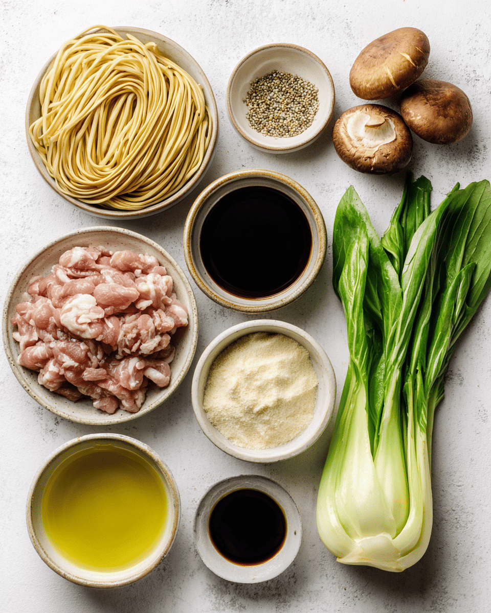 Learn how to make authentic Shanghai Fried Noodles with pork, bok choy, mushrooms, and savory soy glaze in just 20 minutes.